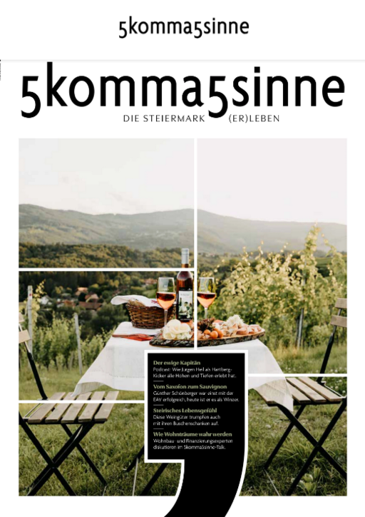 Bildtext: Mit regionalen Köstlichkeiten gedeckter Tisch und im Hintergrund steirische Weinberg (Foto/Quelle: www.5komma5sinne.at).